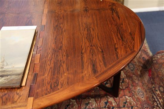 Kurt Ostervig for Jason Mobler, Denmark, 1960s. A rosewood drop-leaf dining table extends to 6ft 4.5in.